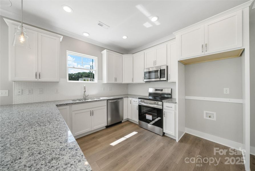 Furnished interior view inside a new home in , Stanfield (Image 5).