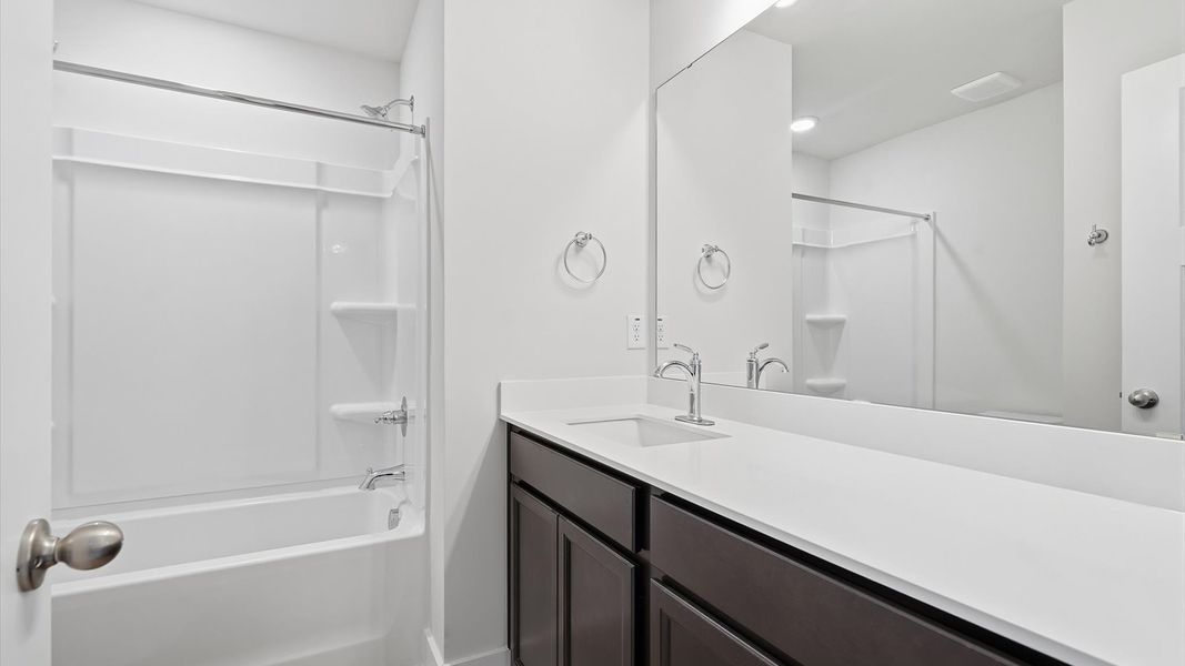 Top-notch bathroom with current fixtures, tasteful materials, and elevated charm near Downtown Greenville
