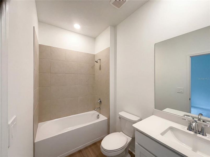 Furnished interior view inside a new home in Grand Park, Dunnellon (Image 5).