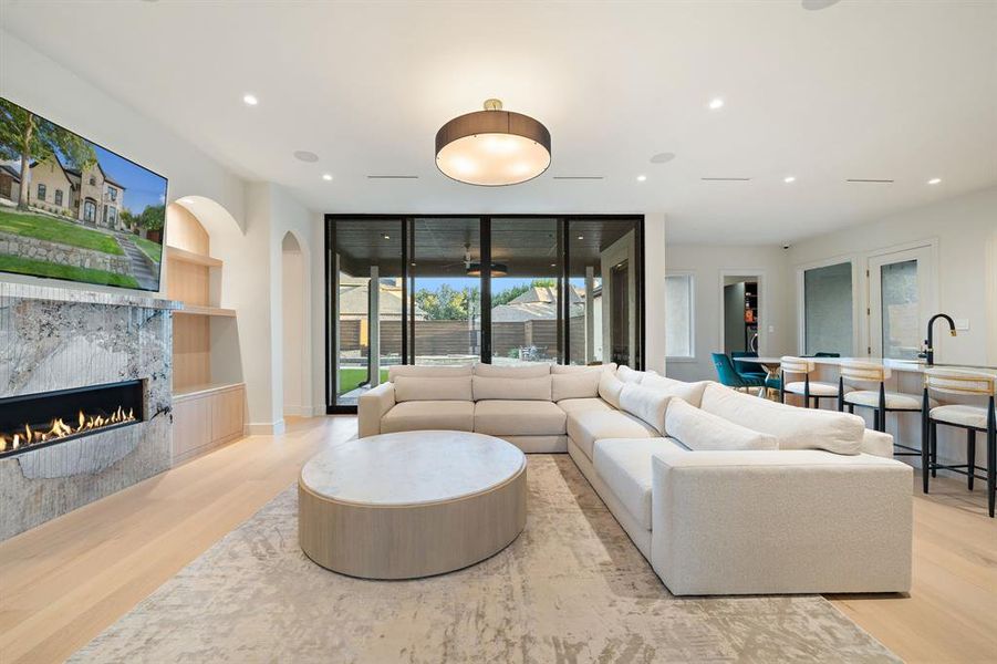 Love this living room? It can be yours! Large open space, Western premium patio door for seamless indoor-outdoor flow...it's a dream space!