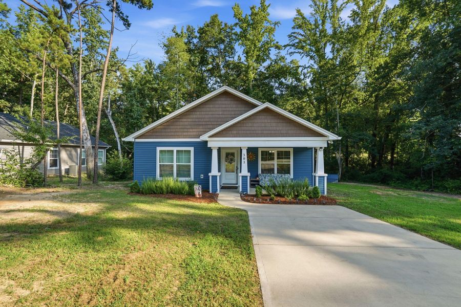 Front exterior of a new home in , St. Matthews, SC, highlighting curb appeal (Image 20).