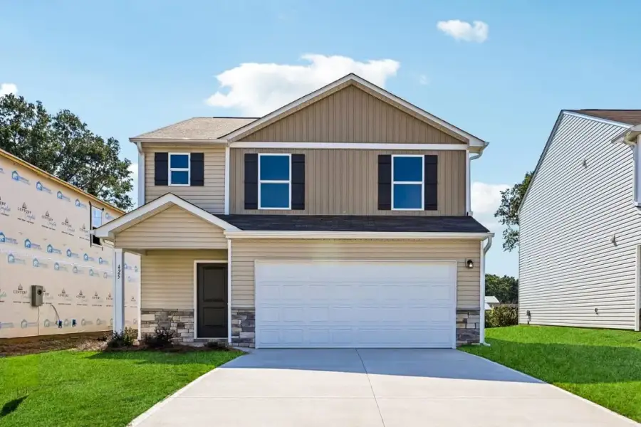 Front exterior of a new home in Moss Creek, Spartanburg, SC, highlighting curb appeal (Image 1). Front exterior of a new home in Moss Creek, Spartanburg, SC, highlighting curb appeal (Image 1).