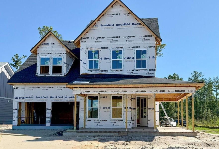 Front exterior of a new home in Single Family Homes at Nexton, Summerville, SC, highlighting curb appeal (Image 23). Front exterior of a new home in Single Family Homes at Nexton, Summerville, SC, highlighting curb appeal (Image 23).