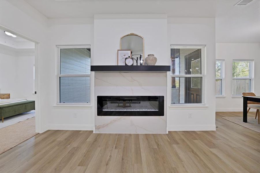 Unfurnished living room with light hardwood / wood-style flooring