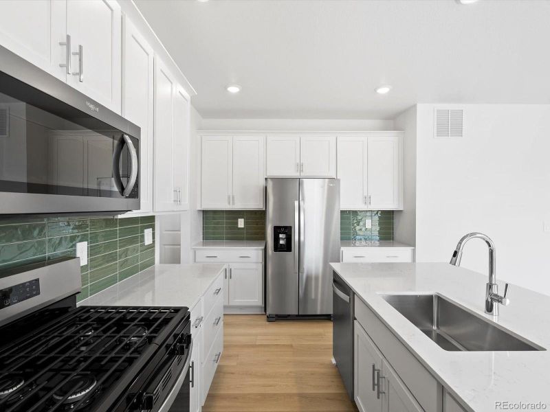 Furnished interior view inside a new home in Poudre Heights: The Lakes Collection, Windsor (Image 10).