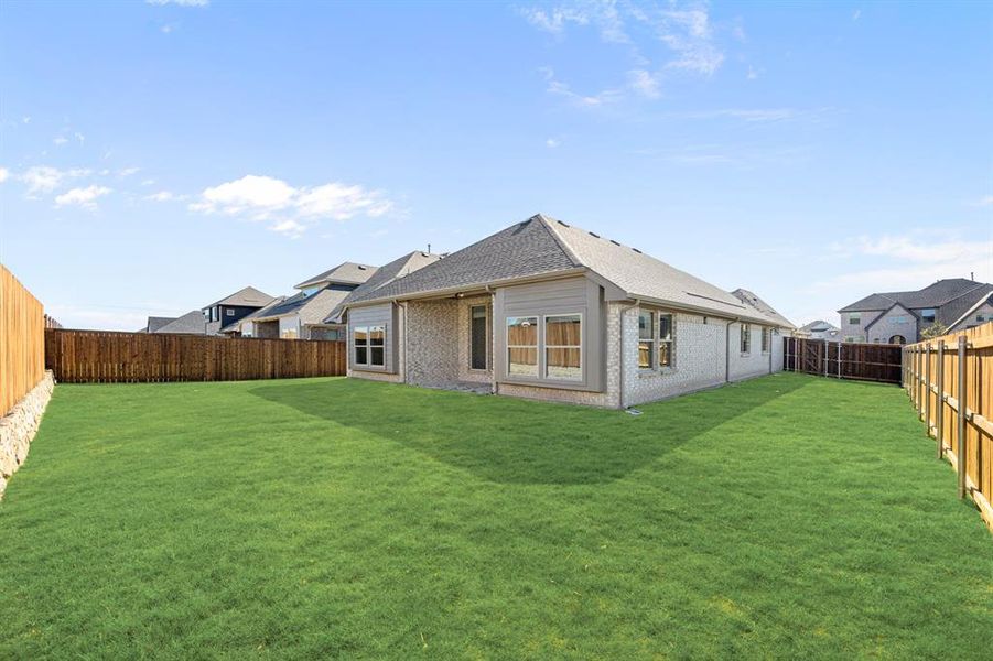 Exterior details and patio area of a home in Sonoma Verde, McLendon-Chisholm (Image 22).