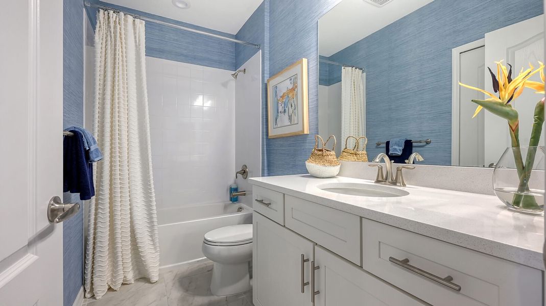 Representative furnished interior of a home built from the Avery by Neal Communities in Grand Park, Sarasota (Image 35).