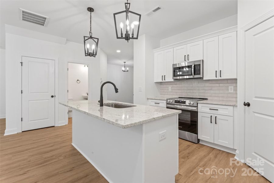 Furnished interior view inside a new home in , Albemarle (Image 14).