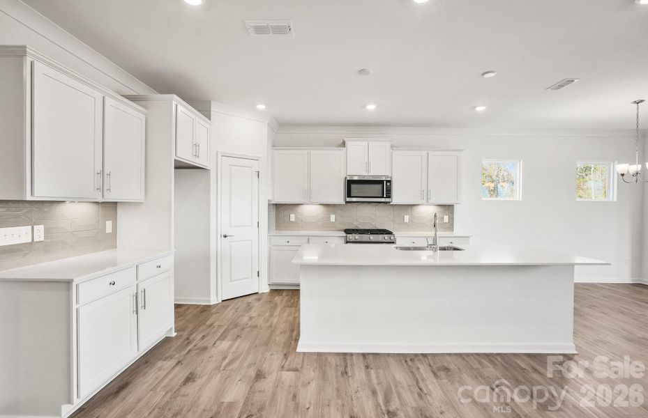 Furnished interior view inside a new home in Riverstone, Monroe (Image 4).