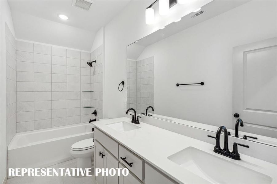 Friends and family will feel right at home in this beautifully finished guest bath.  REPRESENTATIVE PHOTO