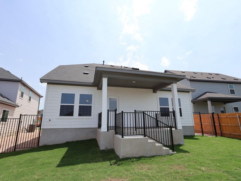 Exterior details and patio area of a home in Cascades at Onion Creek, Austin (Image 4).