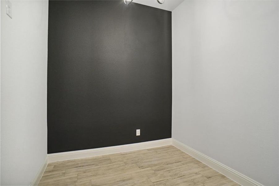 Empty room featuring light hardwood / wood-style floors