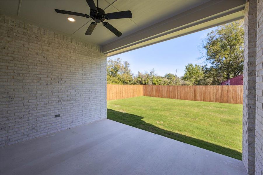 View of patio with ceiling fan