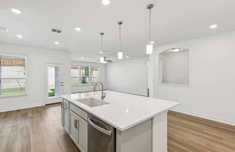 Spacious kitchen with eat-in bartop island Spacious kitchen with eat-in bartop island
