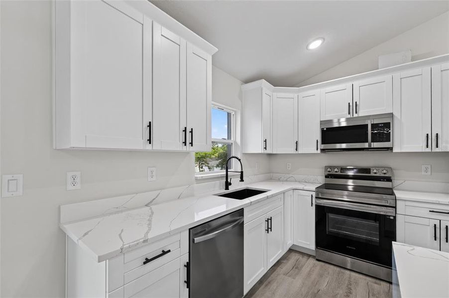 Furnished interior view inside a new home in , Dunnellon (Image 7).