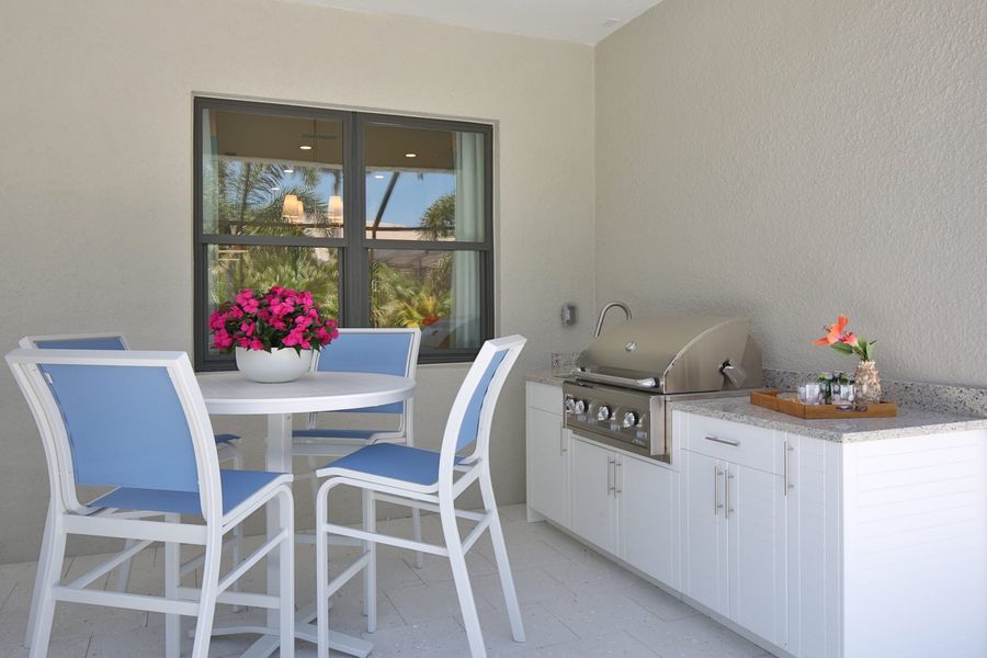 Furnished interior view inside a new home in Boca Royale Golf & Country Club at Wellen Park, Englewood (Image 28).