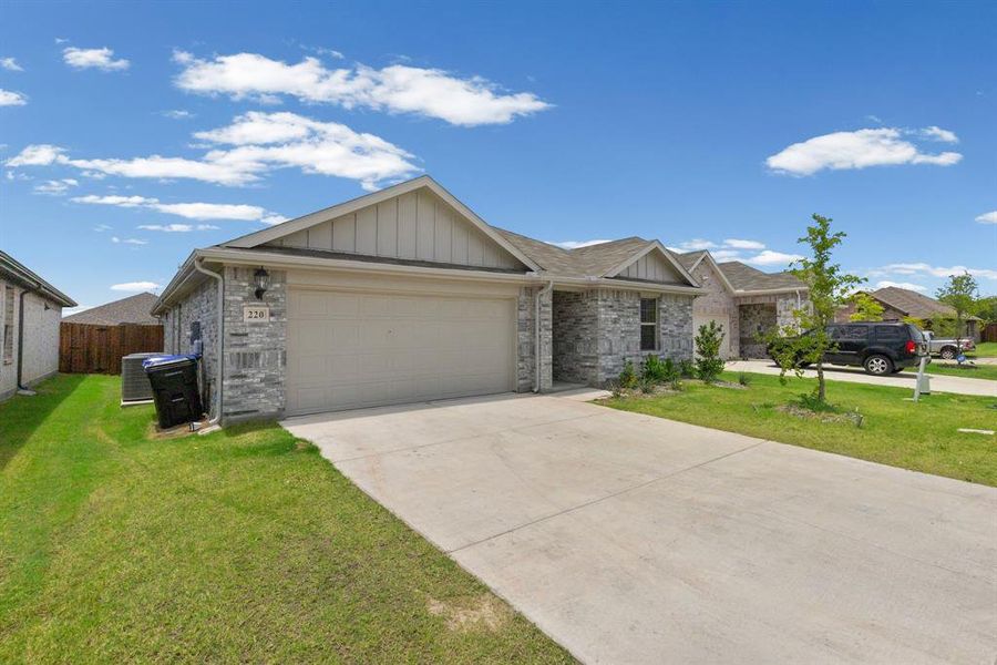 Front exterior of a new home in Stratton Place, Greenville, TX, highlighting curb appeal (Image 2). Front exterior of a new home in Stratton Place, Greenville, TX, highlighting curb appeal (Image 2).