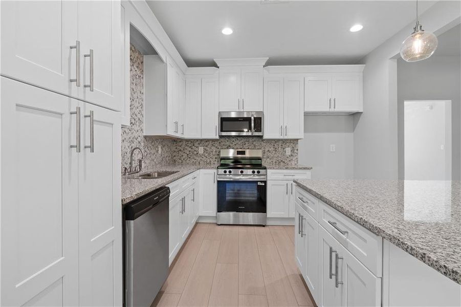 Furnished interior view inside a new home in , Gray (Image 14).