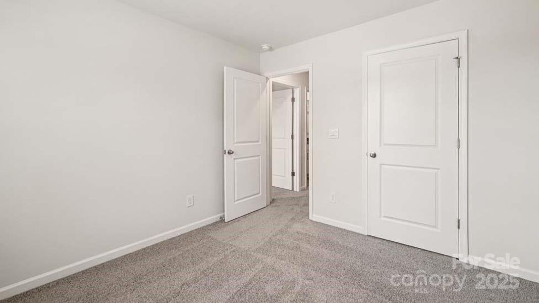 Spacious, unfurnished interior of a new home in Mallard Creek Townhomes, Charlotte (Image 20). Spacious, unfurnished interior of a new home in Mallard Creek Townhomes, Charlotte (Image 20).