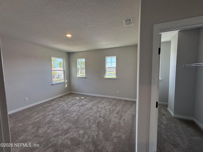 Spacious, unfurnished interior of a new home in Reserve East, Flagler Beach (Image 18).