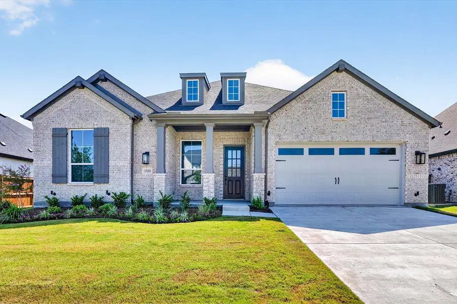 Front exterior of a new home in Monterra, Fate, TX, highlighting curb appeal (Image 1). Front exterior of a new home in Monterra, Fate, TX, highlighting curb appeal (Image 1).
