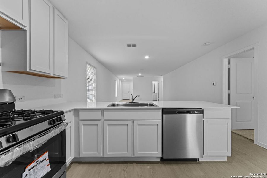 Furnished interior view inside a new home in Torian Village: Belmar Collection, San Antonio (Image 4).