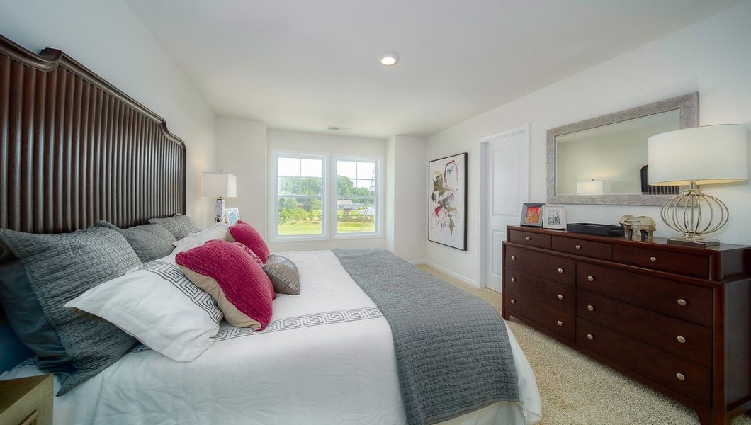 Furnished interior view inside a new home in Townes at Tap Root Farms, Fletcher (Image 23). Furnished interior view inside a new home in Townes at Tap Root Farms, Fletcher (Image 23).