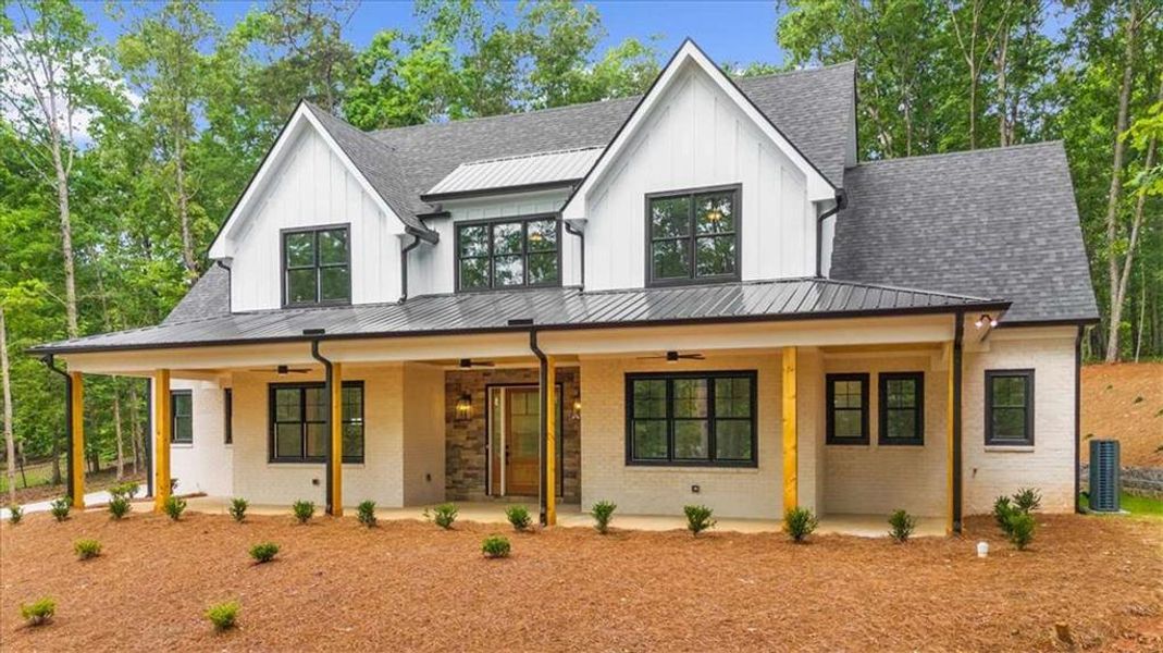 Front exterior of a new home in , Cornelia, GA, highlighting curb appeal (Image 1).