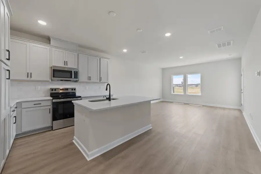 Palmetto floorplan with our Artisan Collection at a nearby community