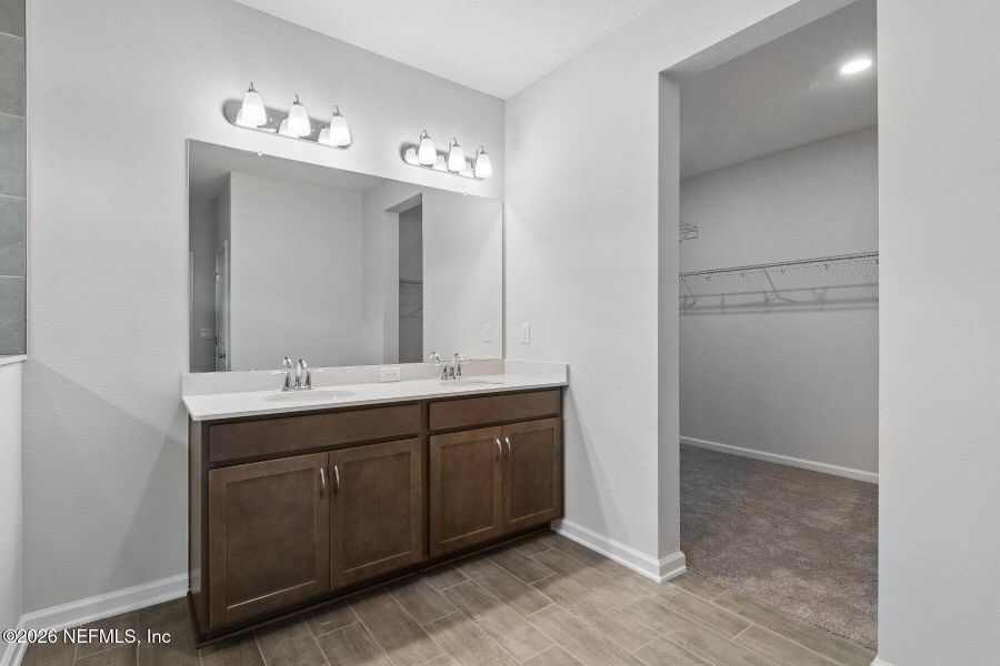 Furnished interior view inside a new home in Tributary 50', Yulee (Image 5).
