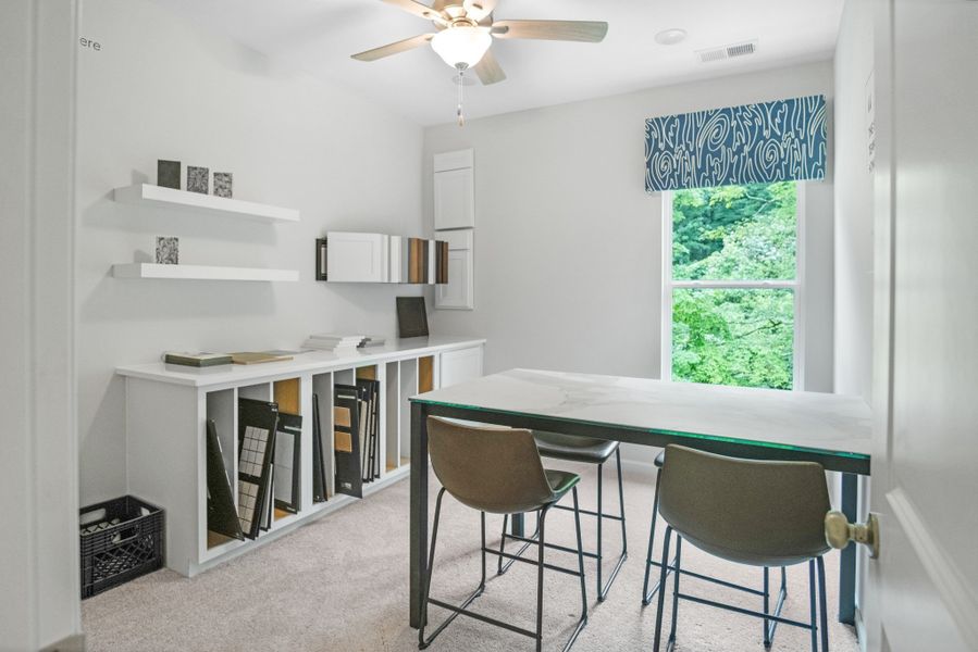 This picture is from our furnished and decorated model home in the community.  Window placement and color scheme may vary per unit location.  Ask agent for more specific details regarding color and options