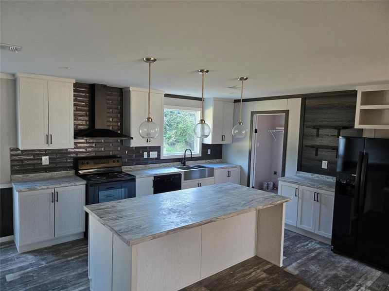 Furnished interior view inside a new home in , Pelican Bay (Image 8).