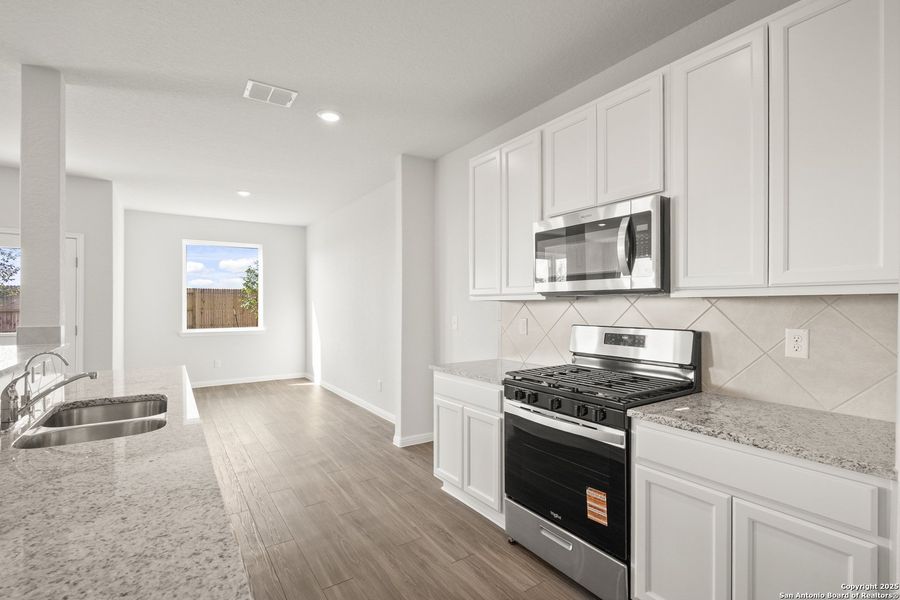 Furnished interior view inside a new home in Timber Creek, San Antonio (Image 11).