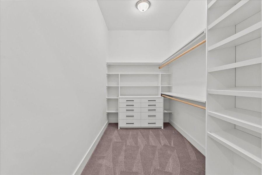 Massive 11.7 x 6.7 guest suite closet.
