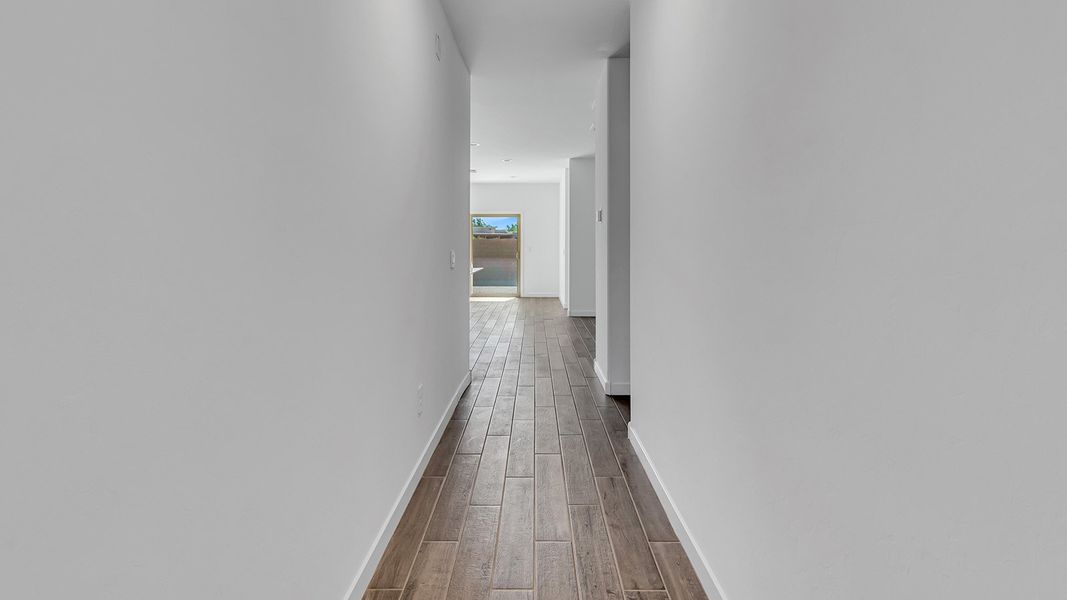 Representative unfurnished interior of a home built from the Harris by D.R. Horton in The Oasis at Rocking K, Vail (Image 19).