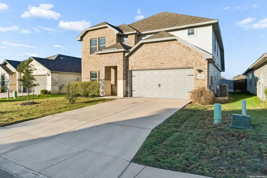 Front exterior of a new home in Autry Pond, San Antonio, TX, highlighting curb appeal (Image 27).