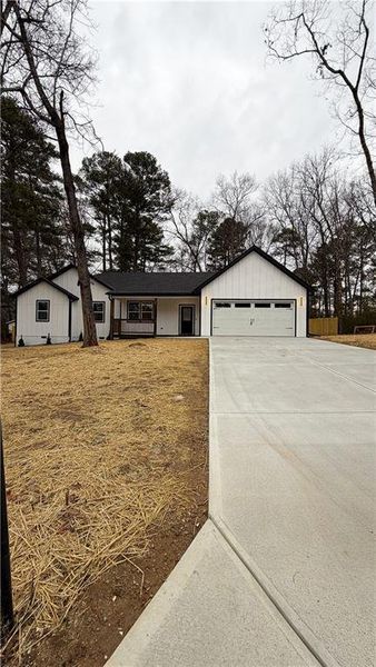 Front exterior of a new home in , Douglasville, GA, highlighting curb appeal (Image 28).