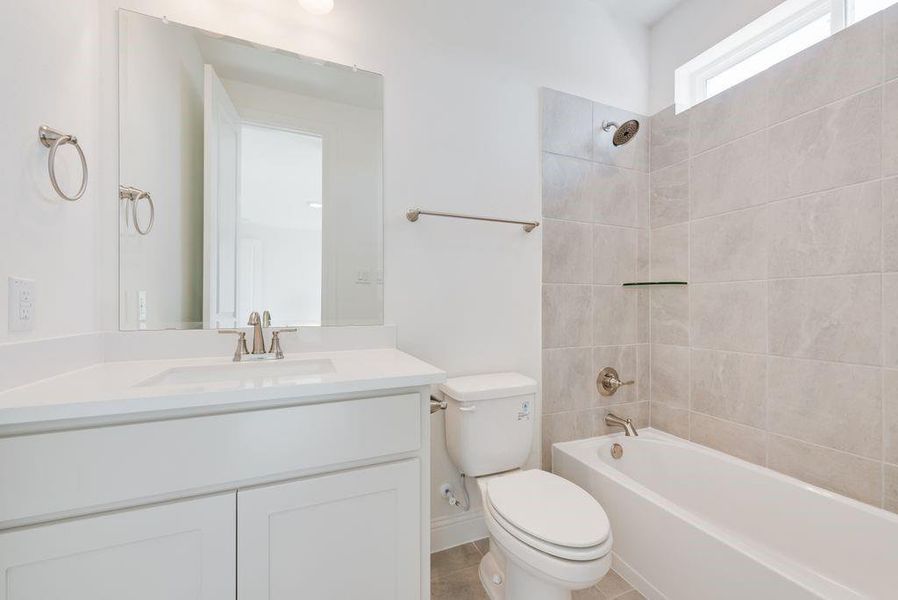 Furnished interior view inside a new home in Park Trails, Forney (Image 17).