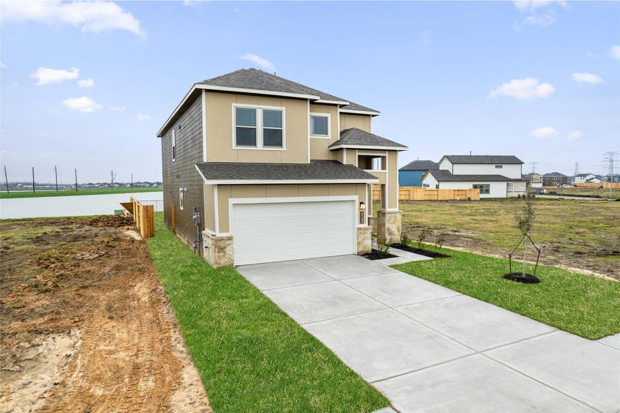 Front exterior of a new home in Glendale Lakes, Rosharon, TX, highlighting curb appeal (Image 1). Front exterior of a new home in Glendale Lakes, Rosharon, TX, highlighting curb appeal (Image 1).