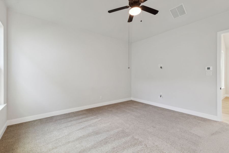 Representative unfurnished interior of a home built from the Bayhill by Cambridge Homes in Lake Park, Rowlett (Image 27).
