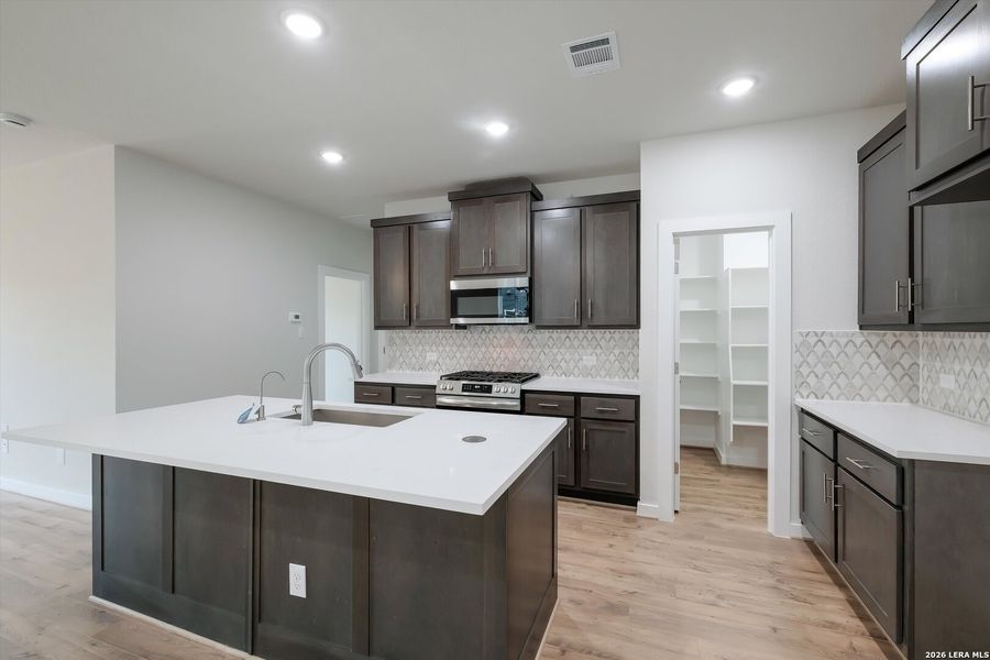 Furnished interior view inside a new home in Avondale, San Antonio (Image 6).