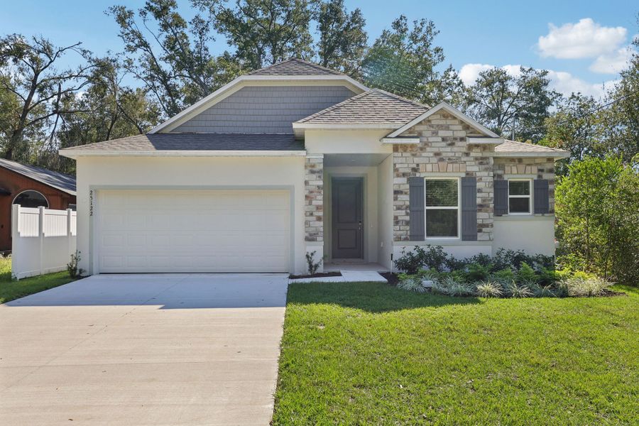 Representative exterior photo of a completed home built from the Drexel by Maronda Homes in Benton Hills, Brooksville, FL (Image 2).