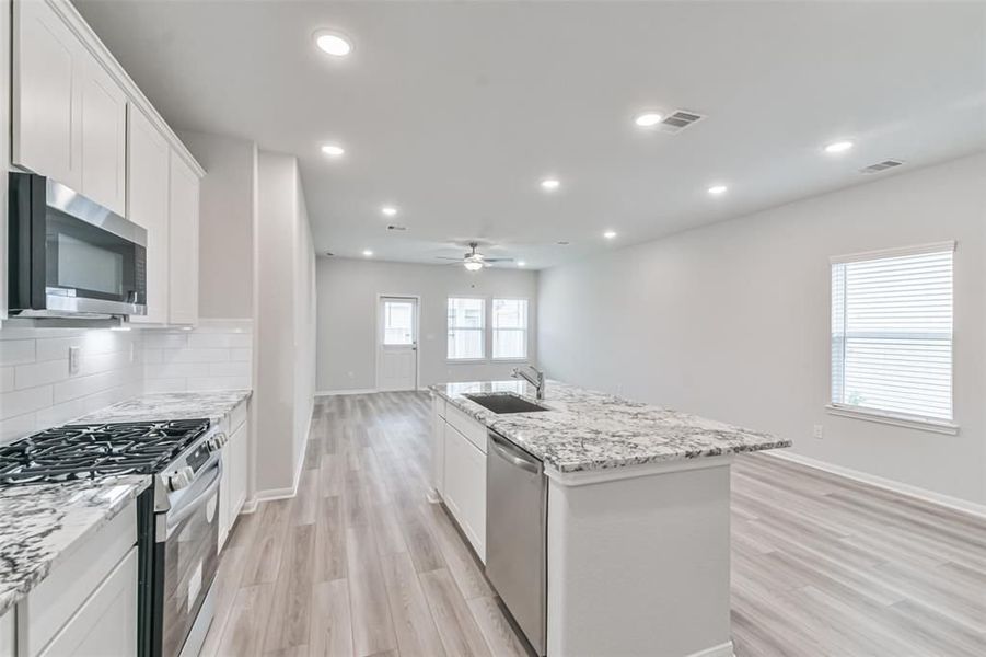 Furnished interior view inside a new home in Lakes at Black Oak, Magnolia (Image 44).