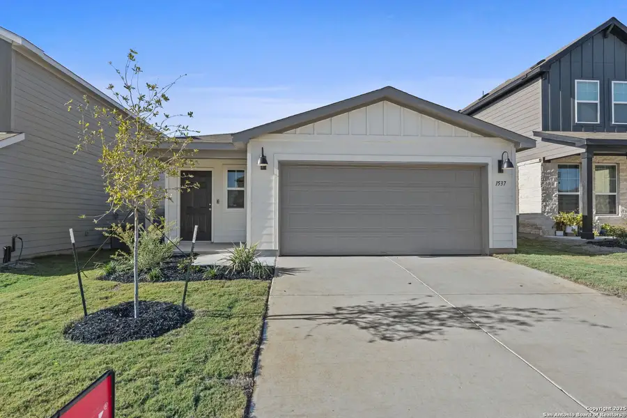 Front exterior of a new home in Meadows at Clear Springs, New Braunfels, TX, highlighting curb appeal (Image 1). Front exterior of a new home in Meadows at Clear Springs, New Braunfels, TX, highlighting curb appeal (Image 1).
