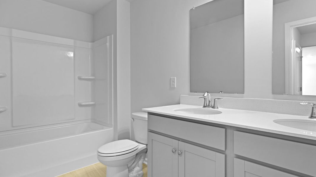 Representative furnished interior of a home built from the BELFORT by D.R. Horton in Founders Corner, Summerville (Image 12).