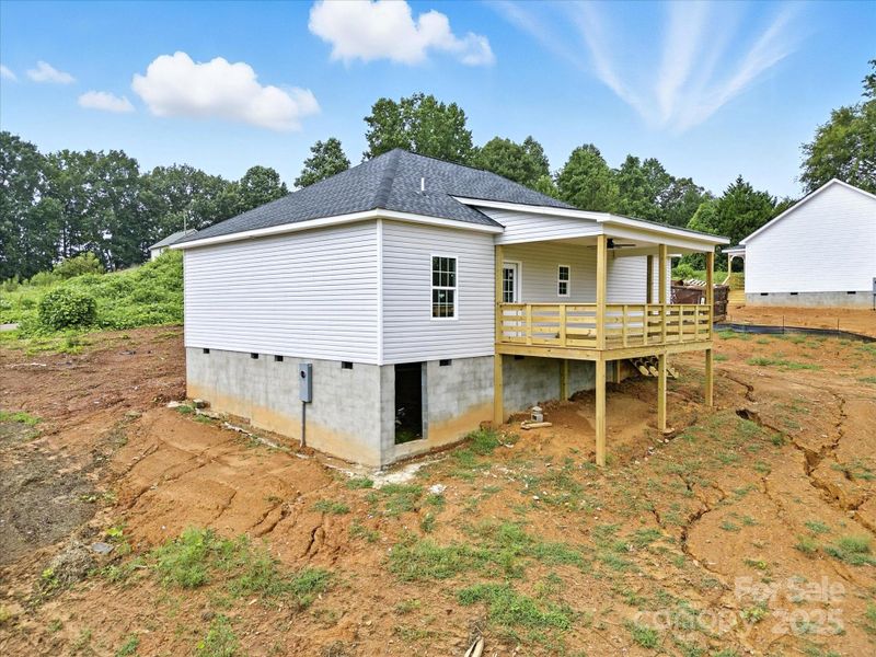 Front exterior of a new home in , Clover, SC, highlighting curb appeal (Image 13).