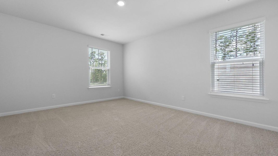 Spacious, unfurnished interior of a new home in Pine Hills at Cane Bay, Summerville (Image 21).