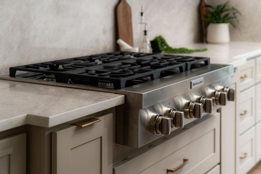 Culinary adventures await with a professional-grade gas range, ready for any gourmet creation.