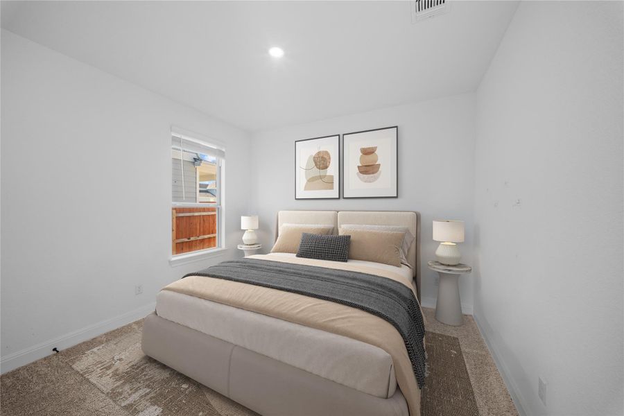 Bedroom with carpet and recessed lighting Bedroom with carpet and recessed lighting