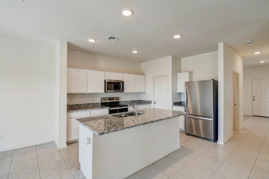Representative furnished interior of a home built from the Spectra by Starlight Homes in Hawks Run, Kissimmee (Image 7). Representative furnished interior of a home built from the Spectra by Starlight Homes in Hawks Run, Kissimmee (Image 7).